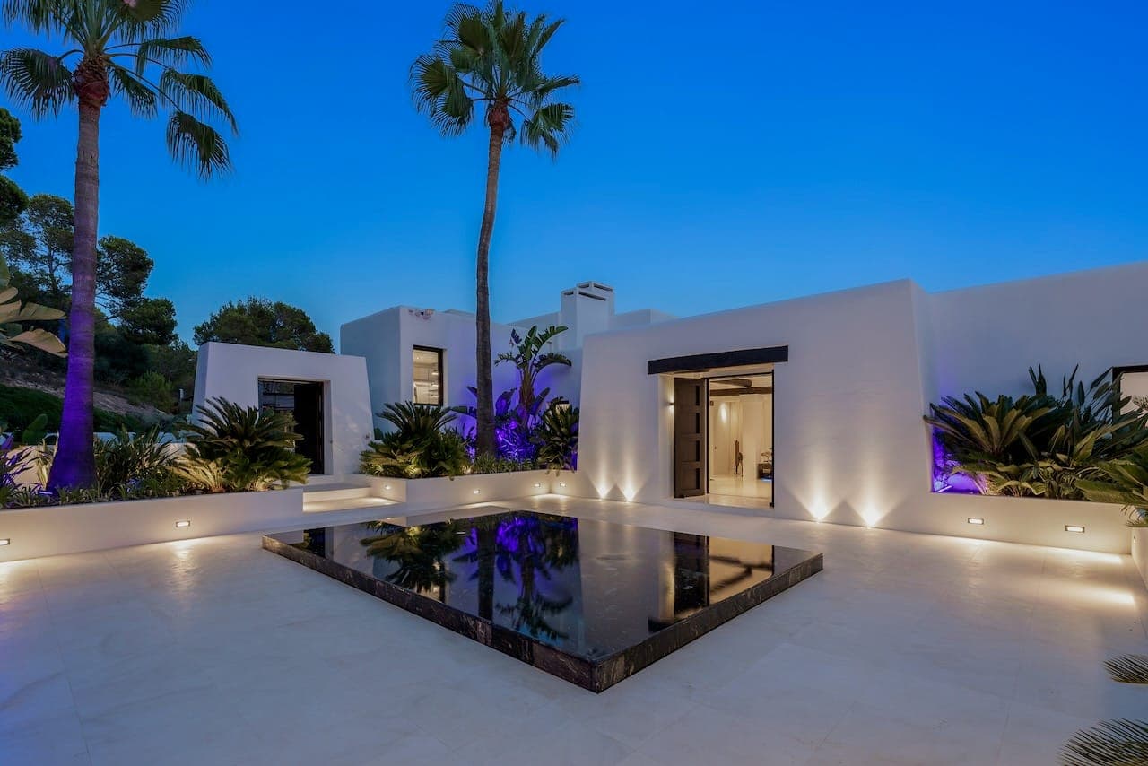 Dusk courtyard reflecting pool casa incendio ibiza spain padel
