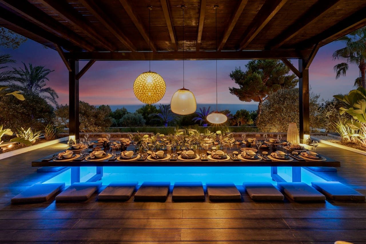 Night pergola dining lanterns casa incendio ibiza spain padel