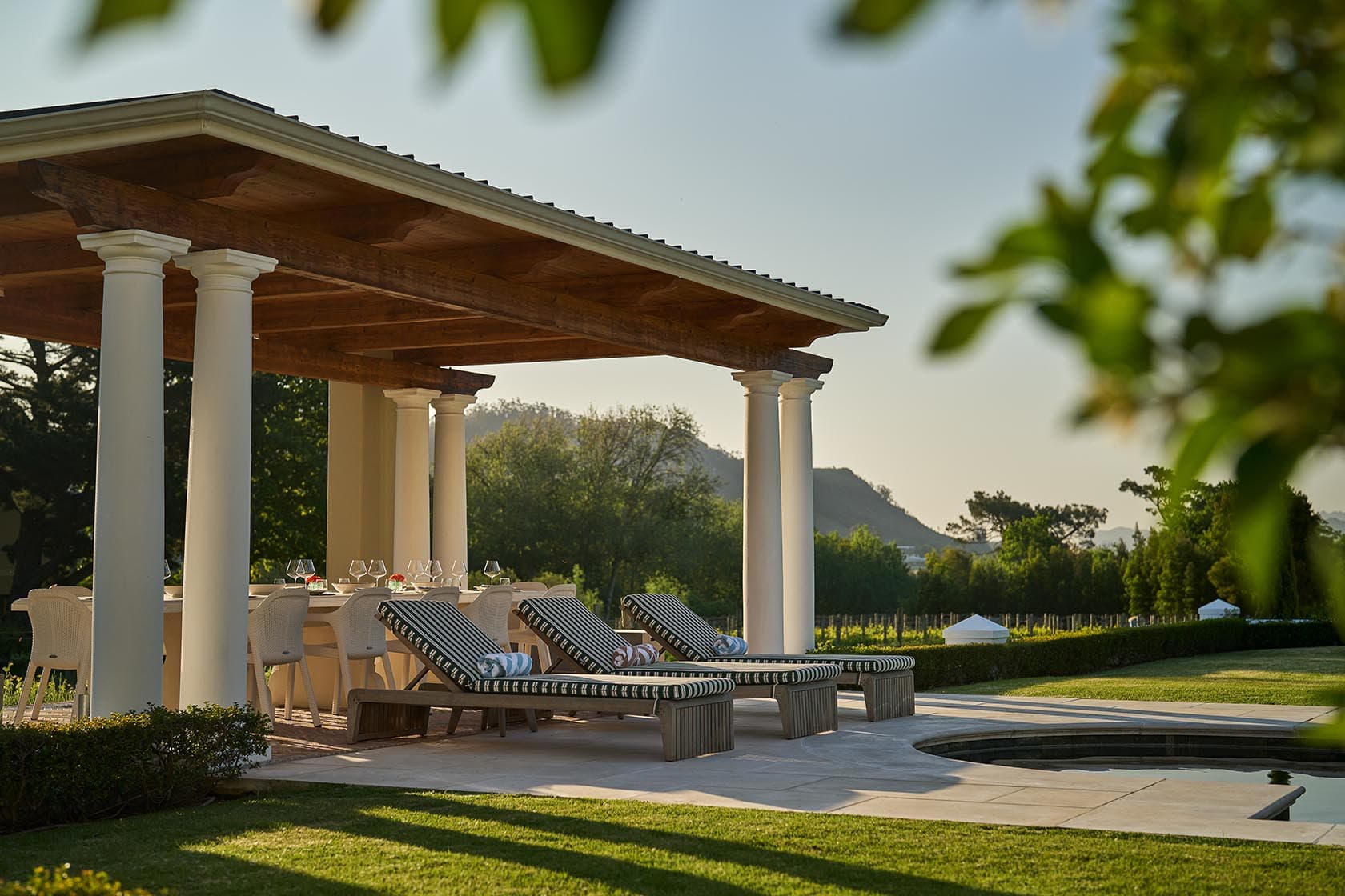 Poolside pavilion sun loungers paddakloof franschhoek south africa padel