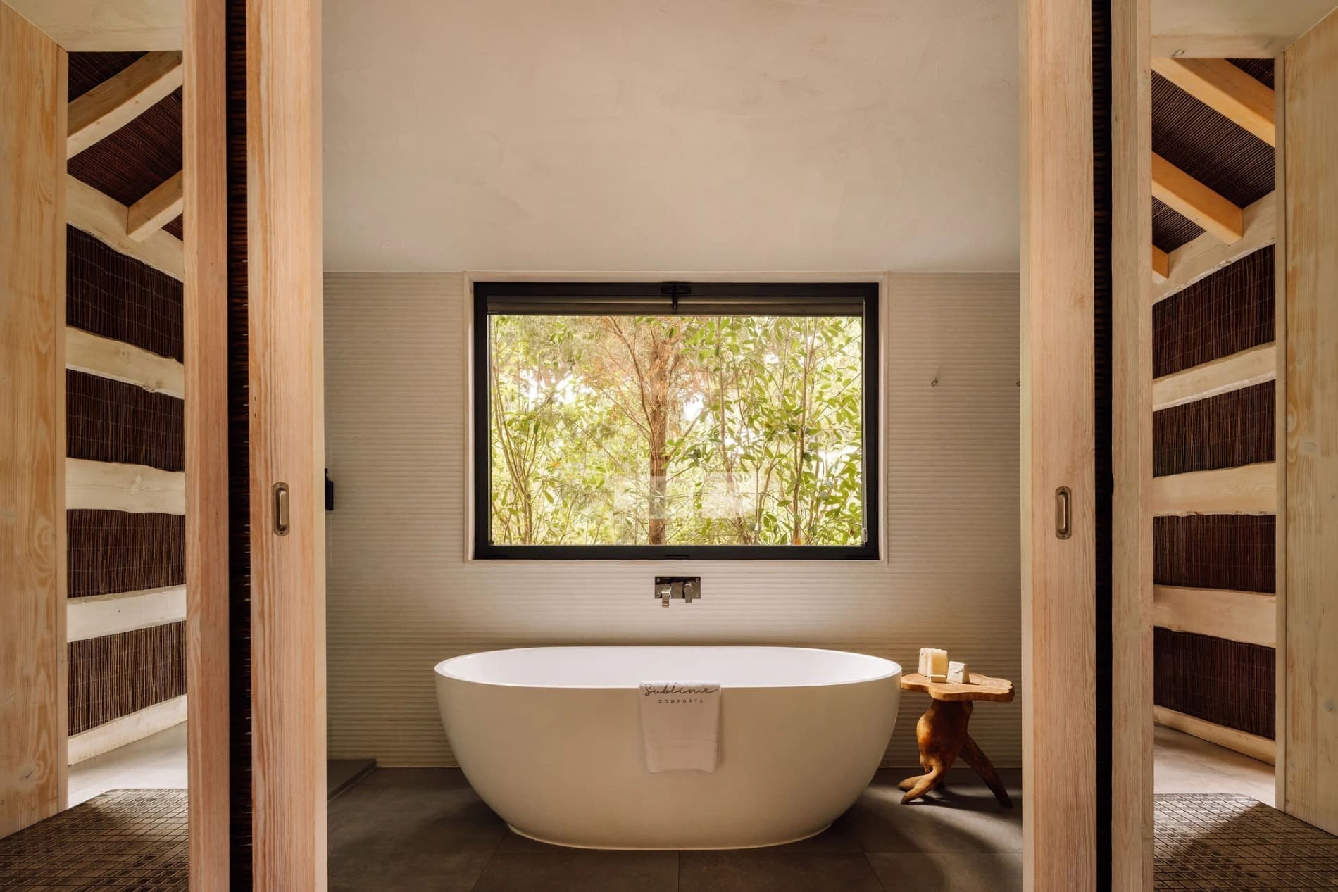 Freestanding bathtub forest window sublime comporta portugal padel