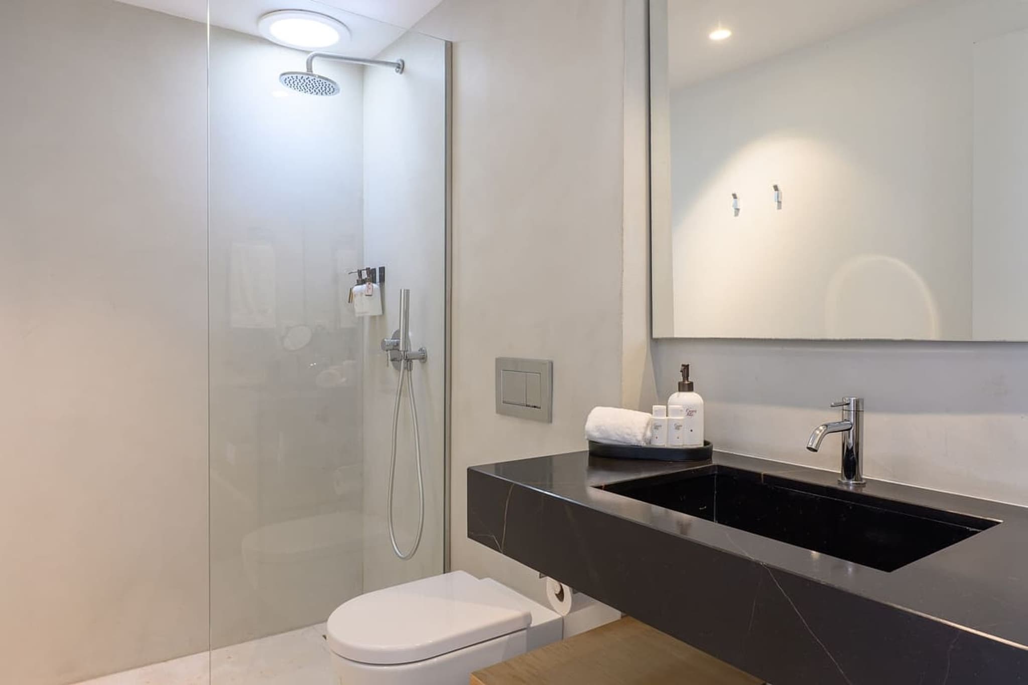 A walk-in shower beside the vanity