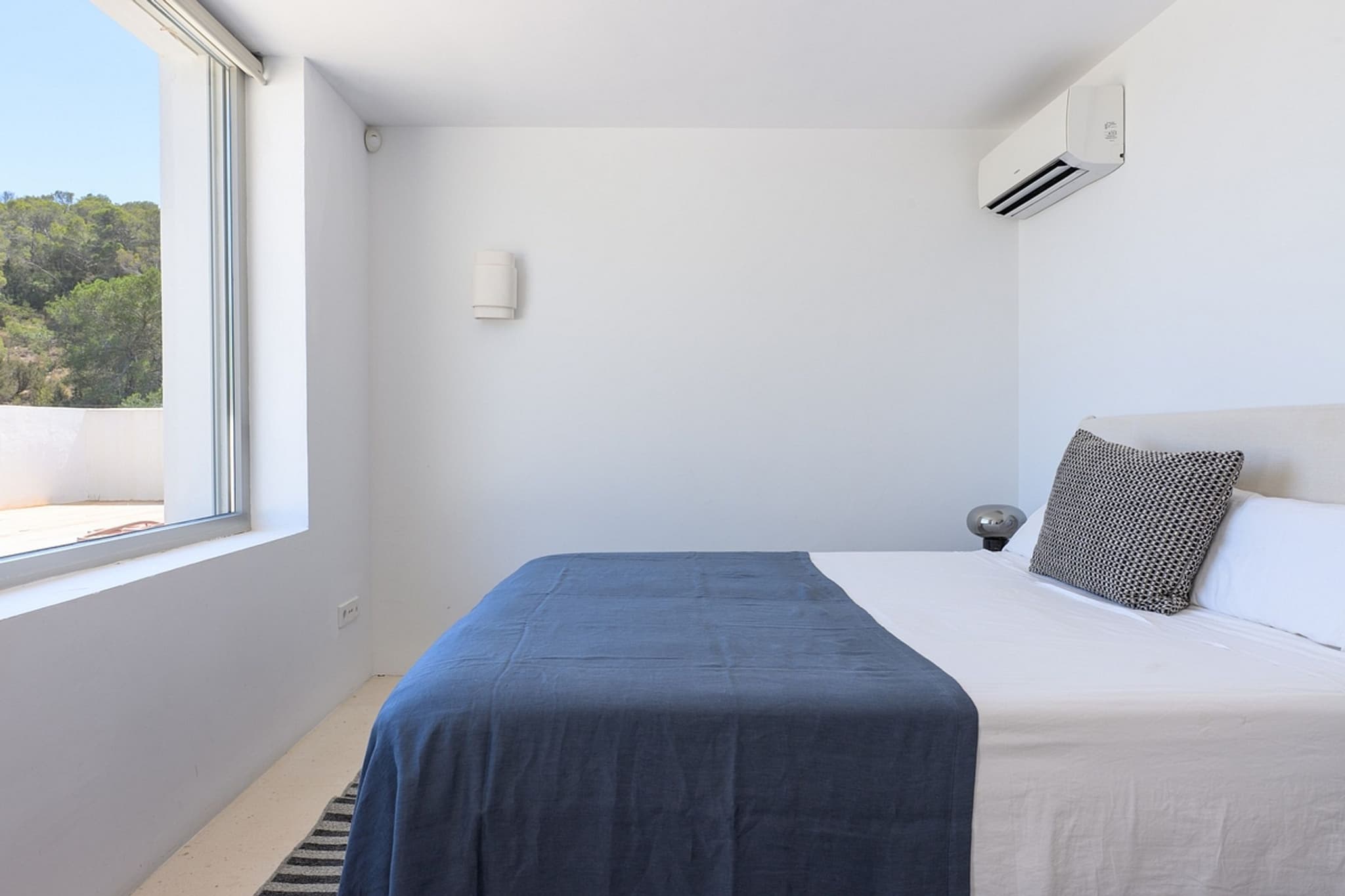 Bedroom blue bed window villa cami ibiza spain padel