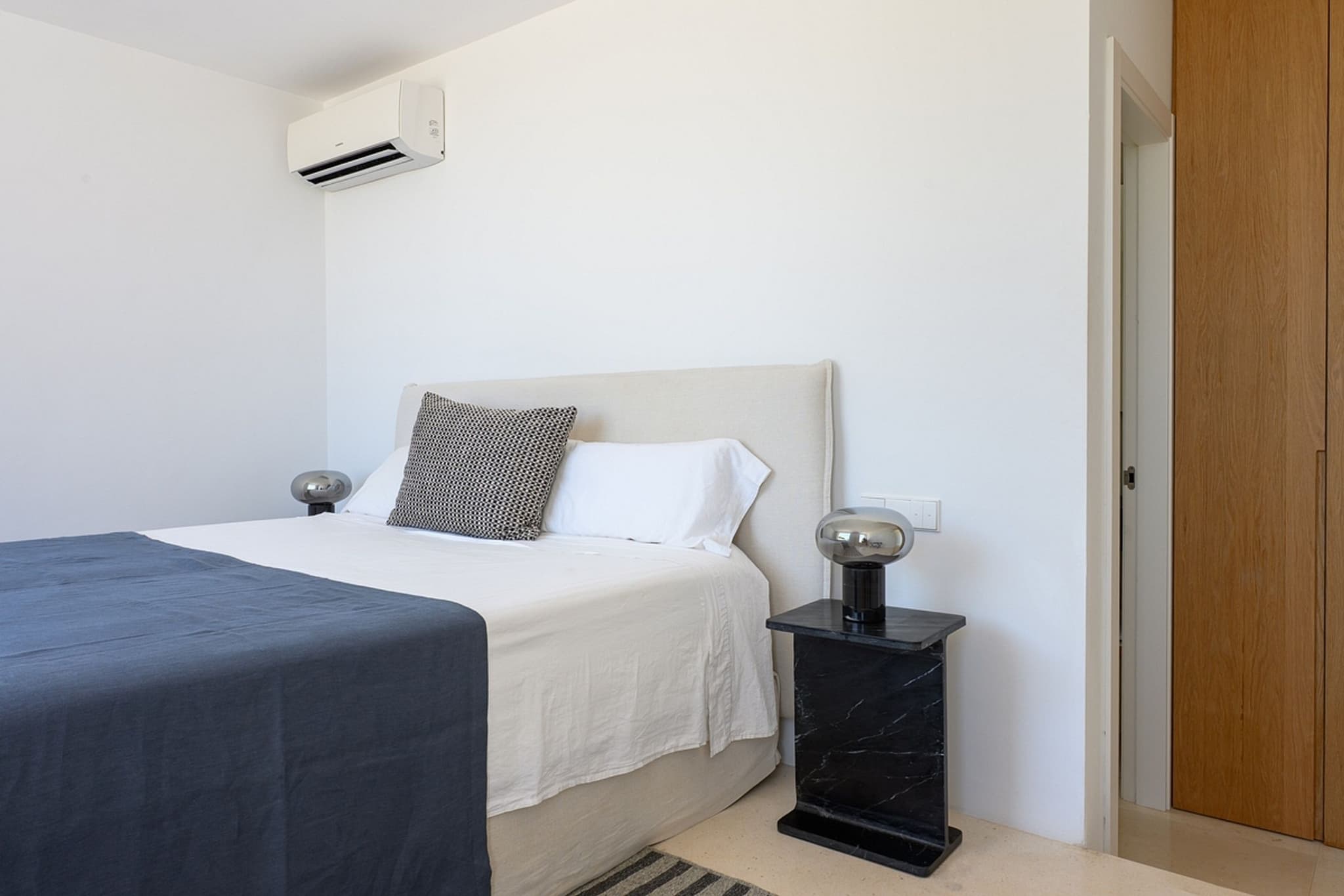 Bedroom blue throw nightstand villa cami ibiza spain padel