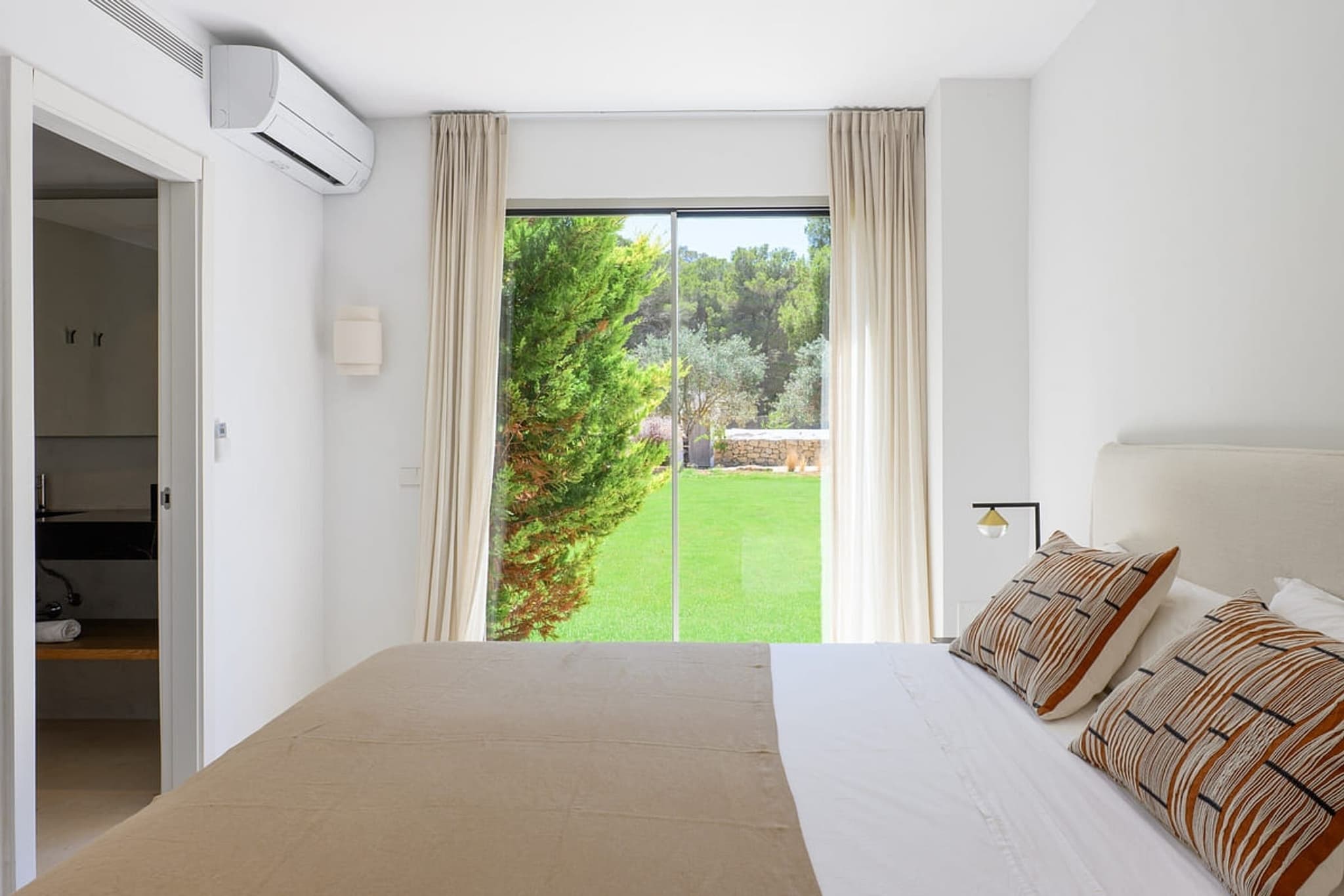 Bedroom garden view ensuite villa cami ibiza spain padel
