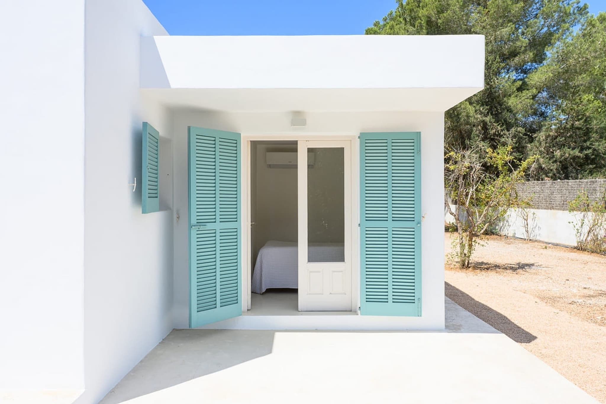 Casita entrance teal shutters villa cami ibiza spain padel