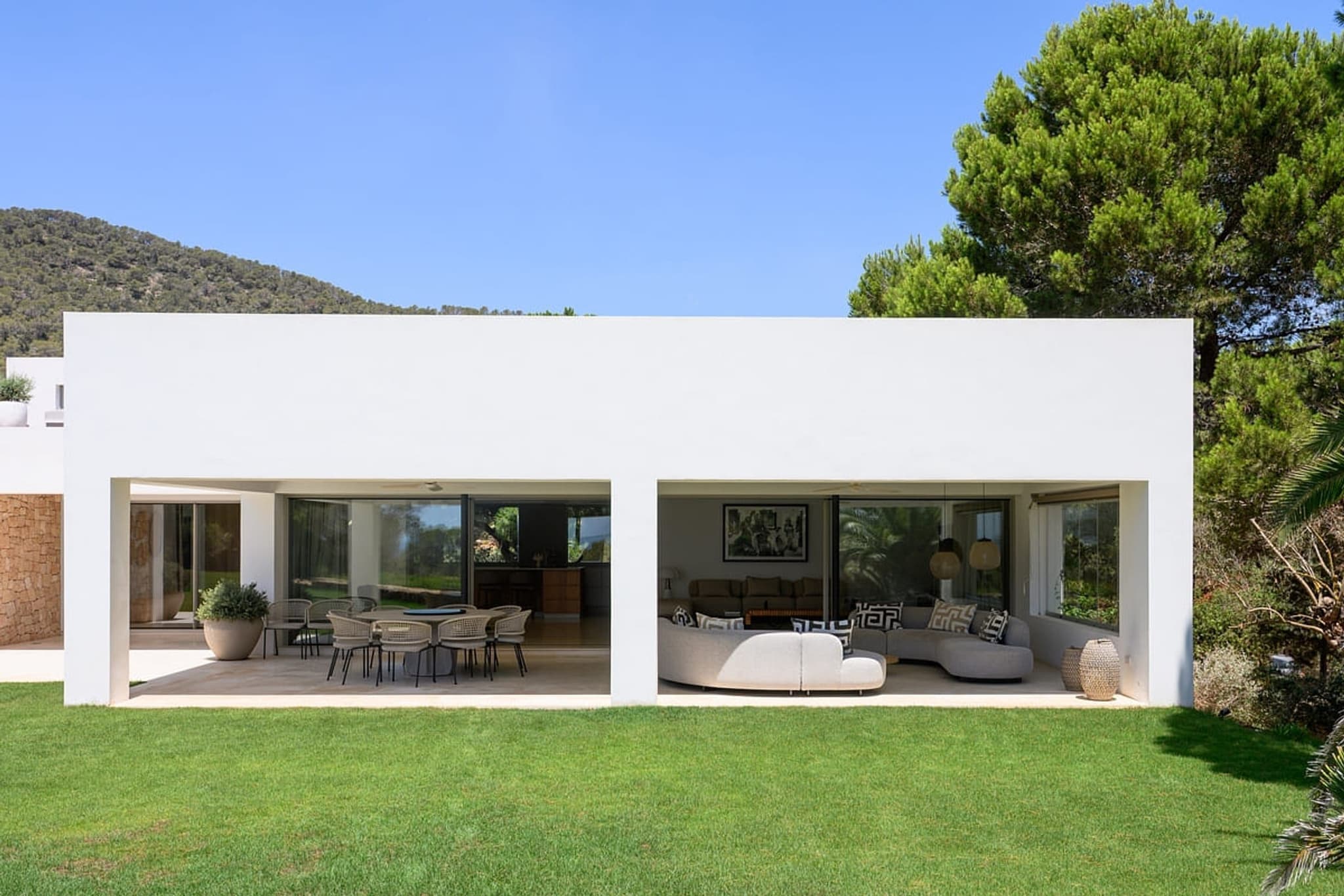 The rear lawn and the back of the villa