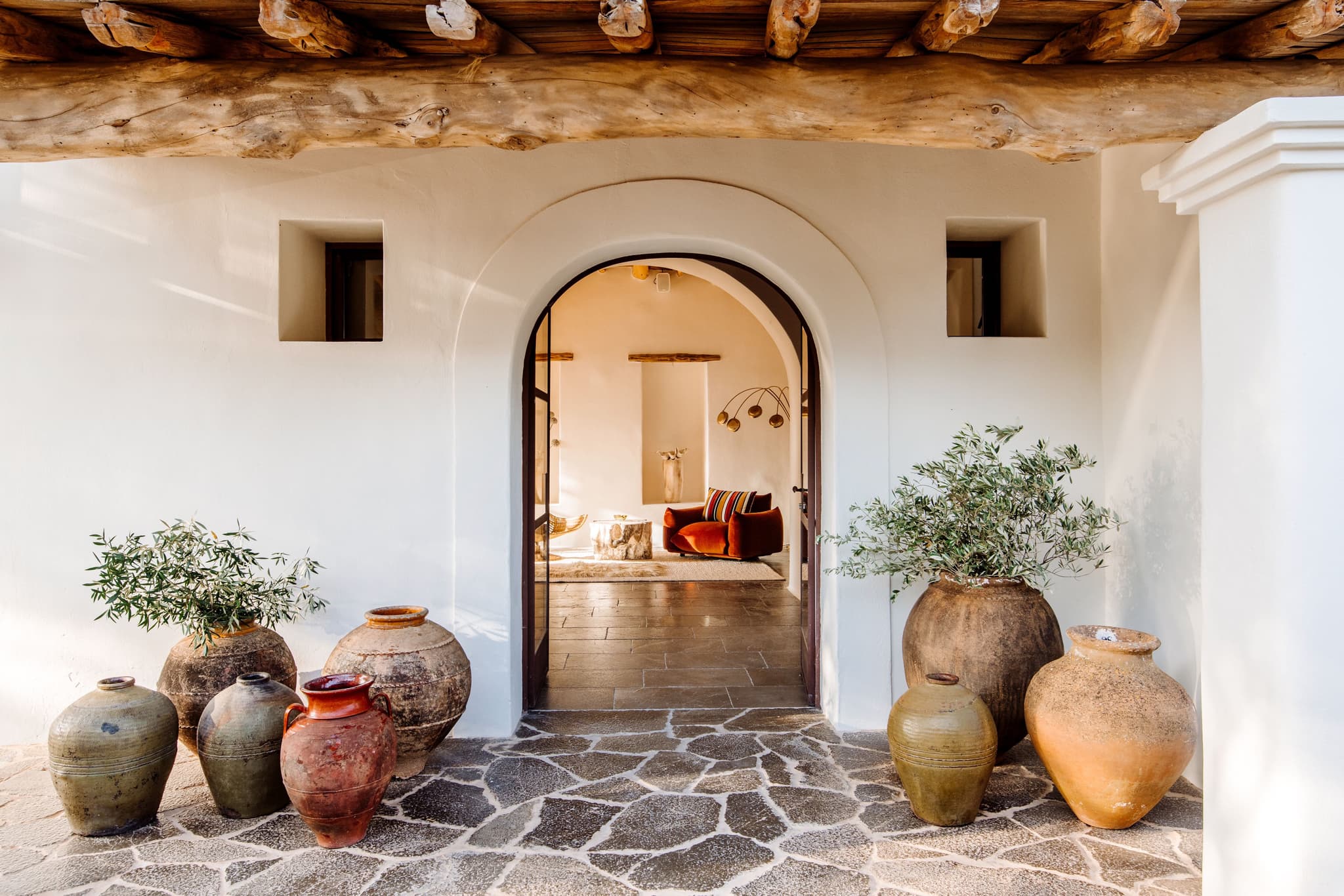 Arched entrance terracotta urns villa clarence ibiza spain padel