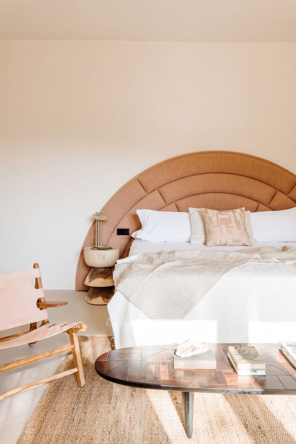 Arched terracotta headboard leather chair villa clarence ibiza spain padel