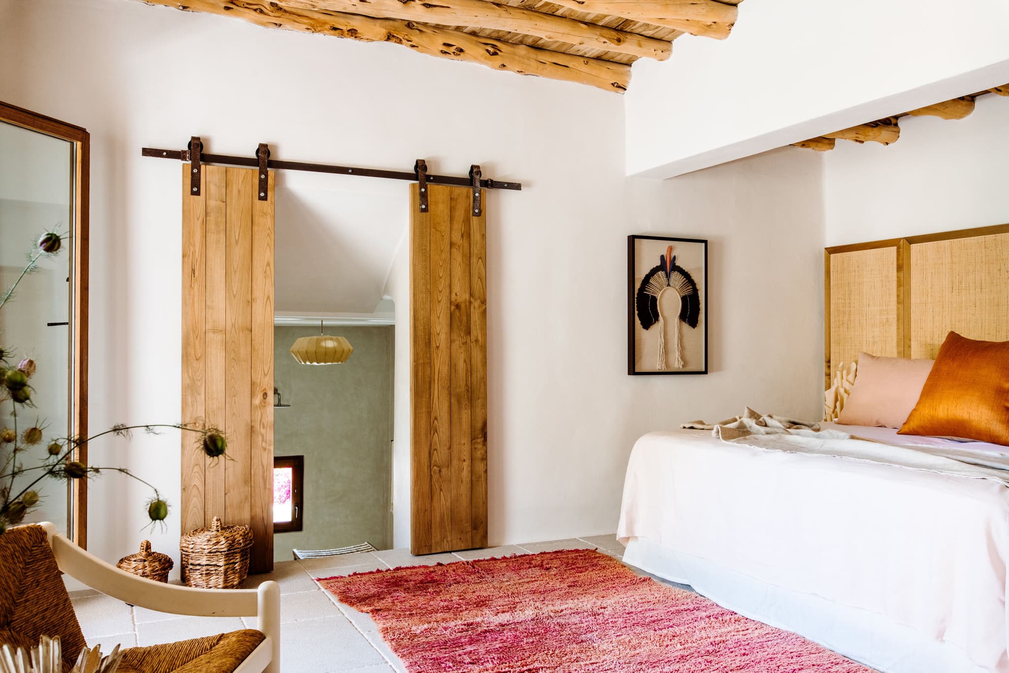 Bedroom barn doors rattan headboard villa clarence ibiza spain padel