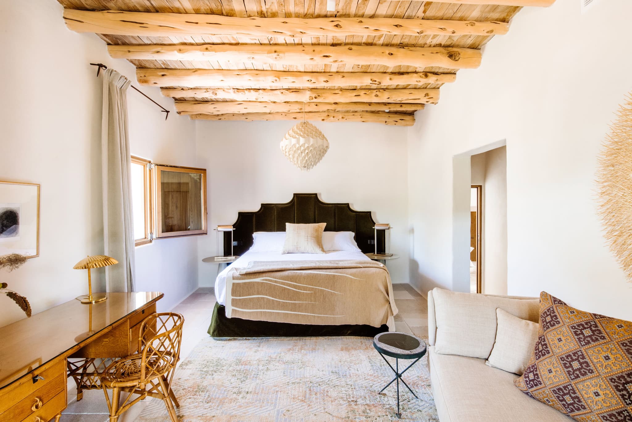 Bedroom black headboard rattan desk villa clarence ibiza spain padel