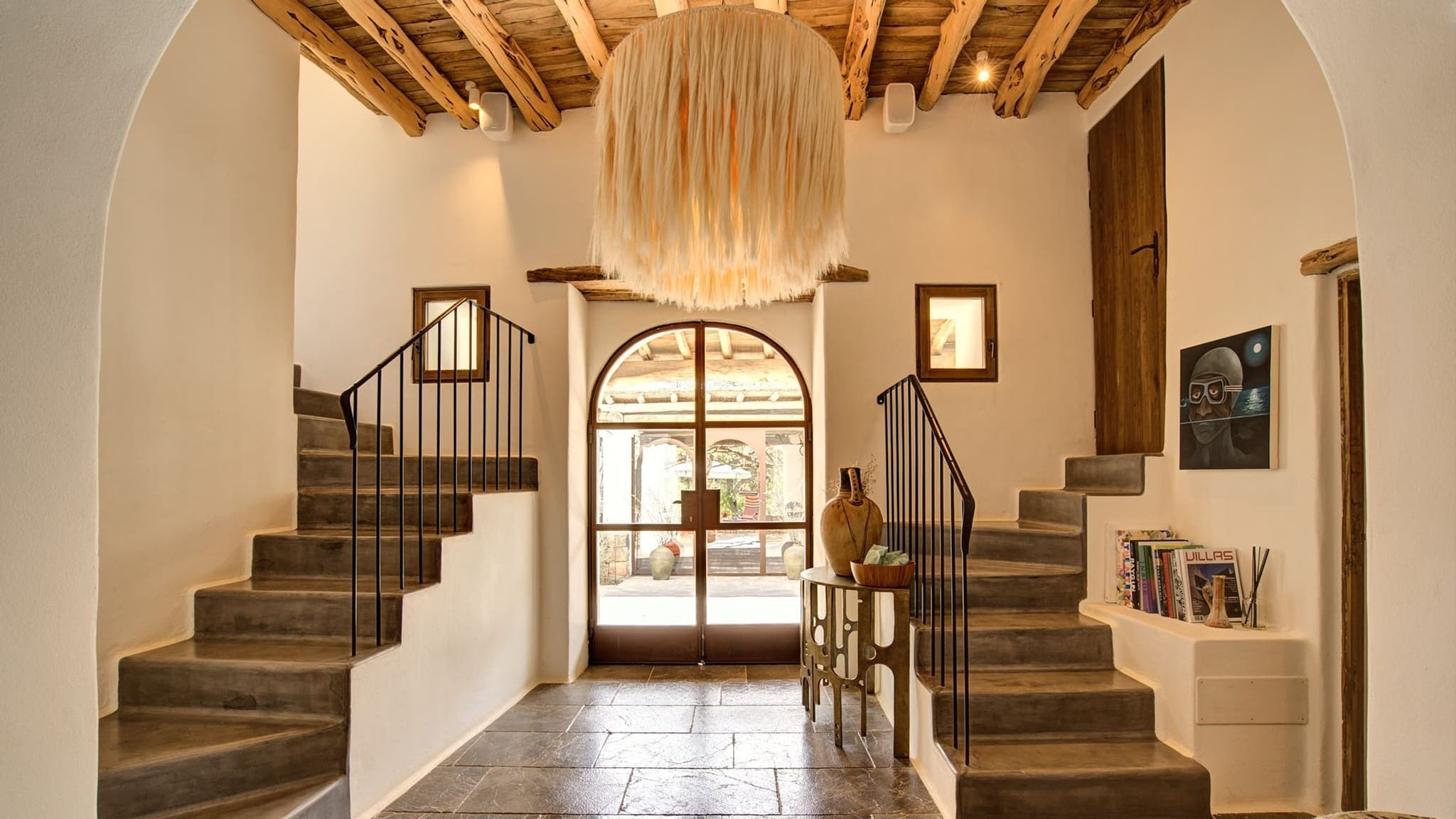 The entrance hall and its twin staircases