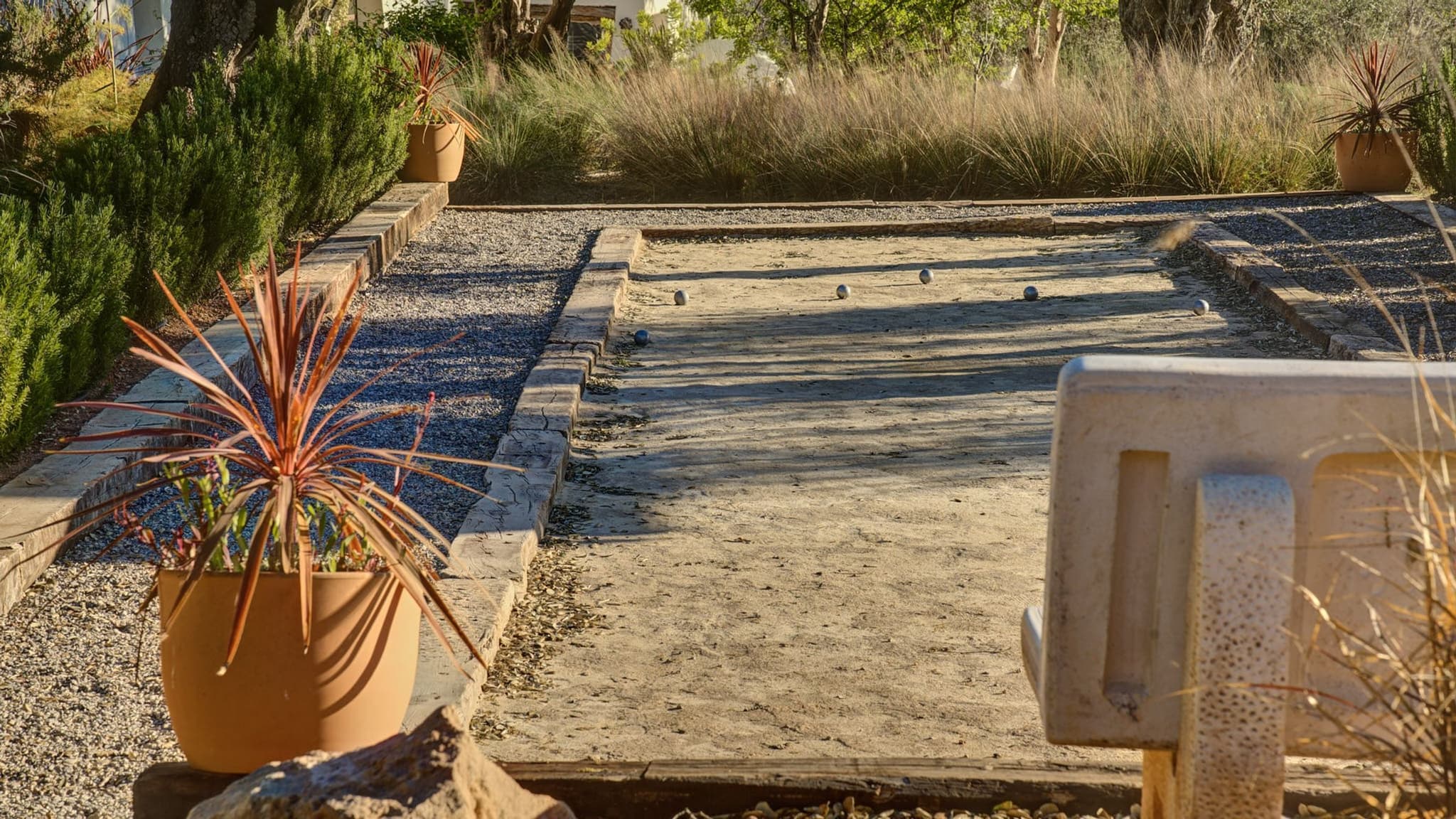 Gravel boules court cordyline villa clarence ibiza spain padel