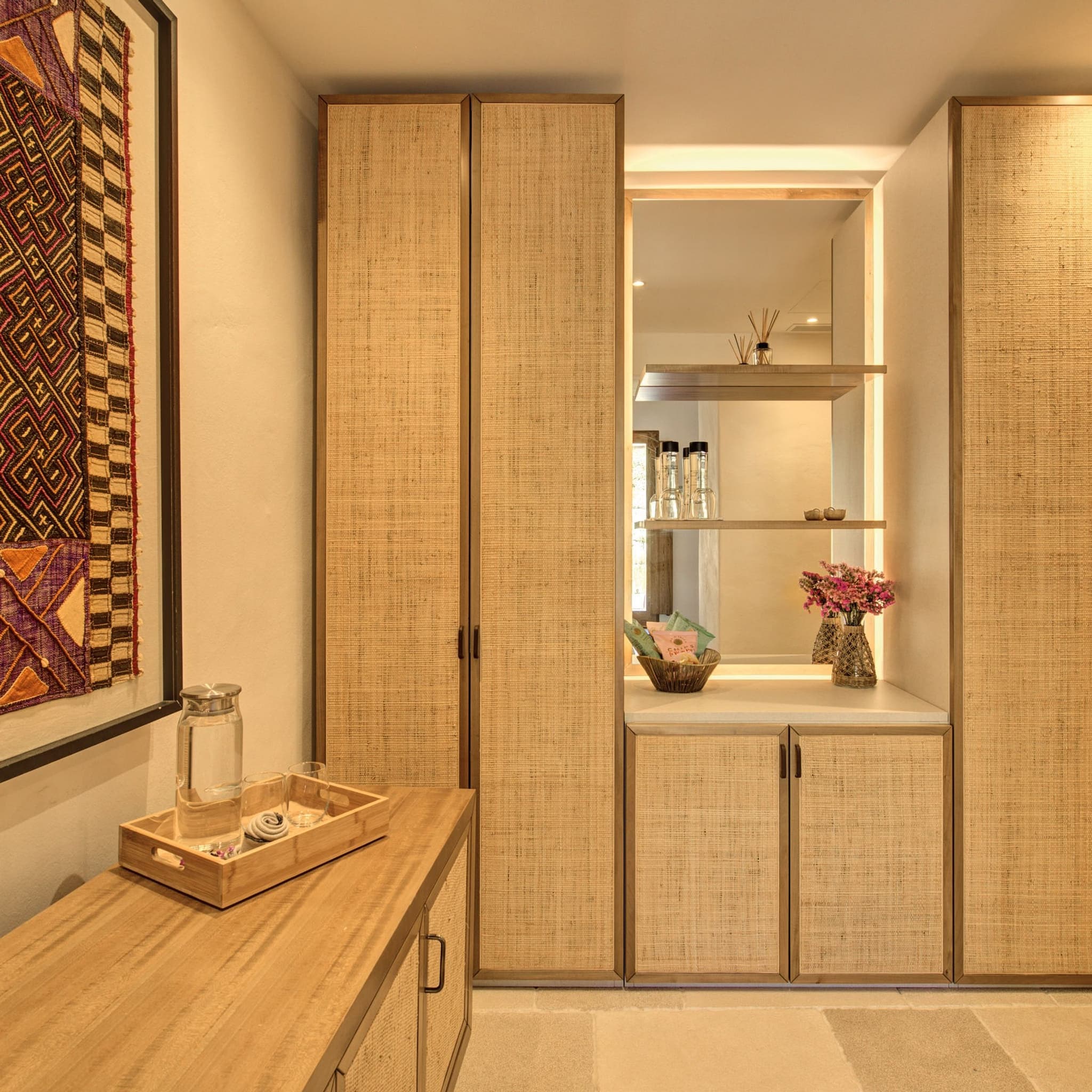 The dressing room and its rattan wardrobes