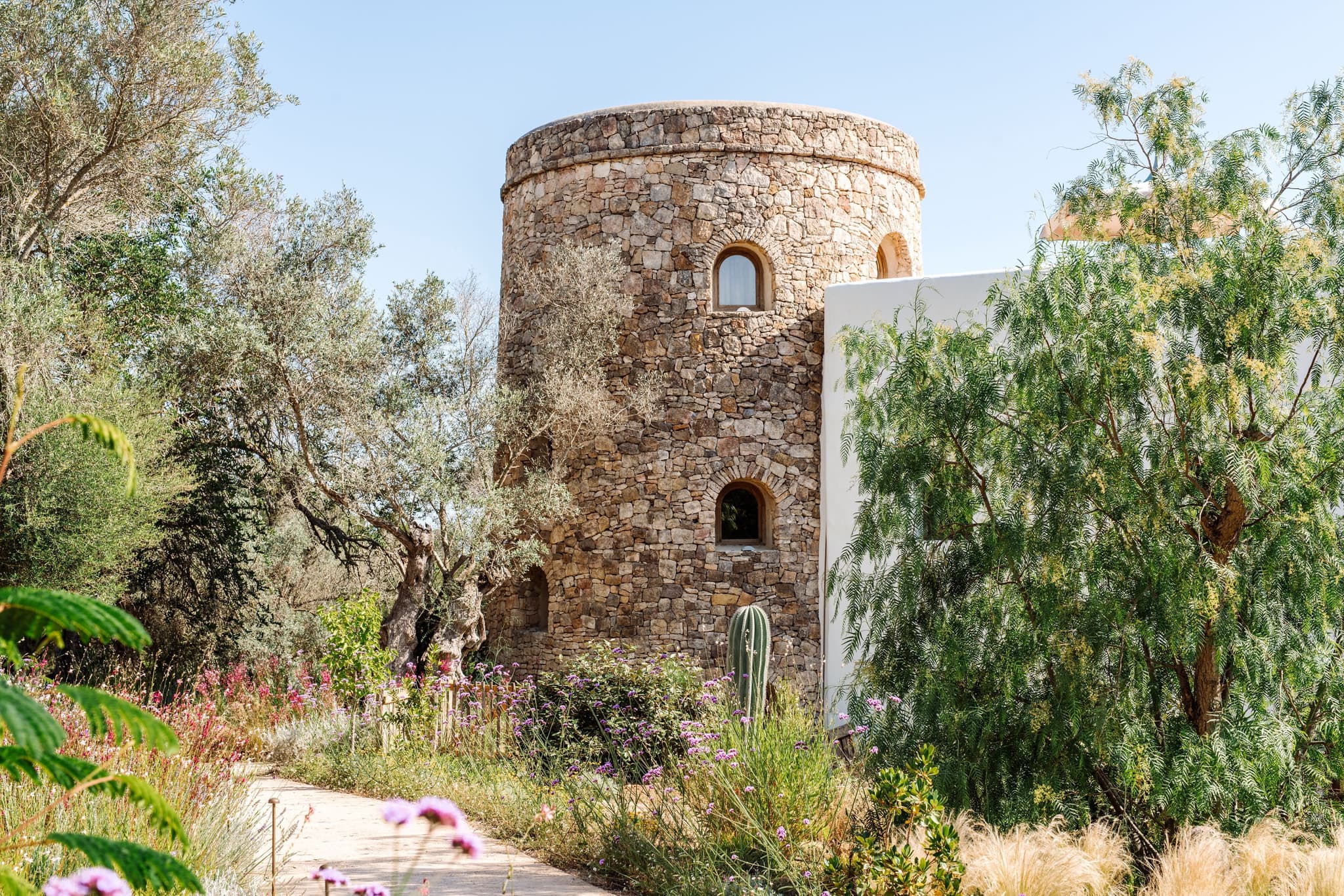 The round stone tower in the wildflowers