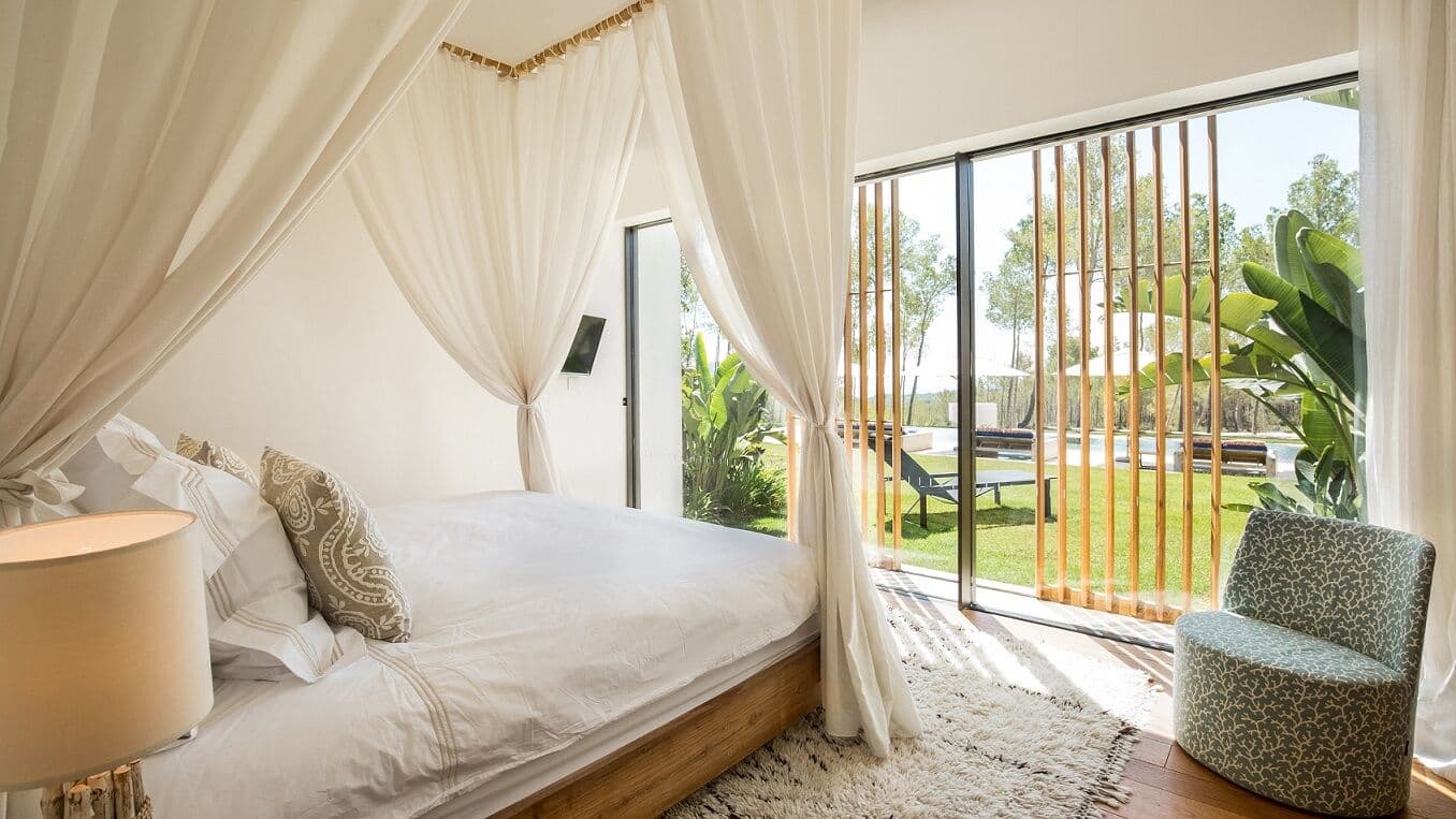 Double bedroom canopy pool view villa fusion ibiza spain padel