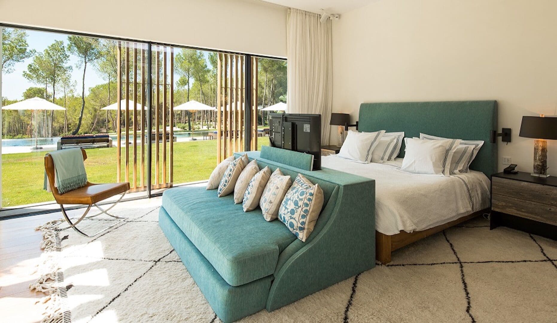 Double bedroom teal pool view villa fusion ibiza spain padel