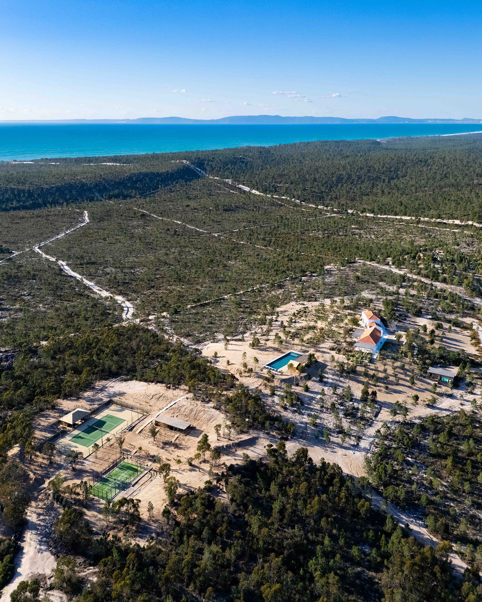 Villa Kaba from the air, the coast and the ocean beyond it