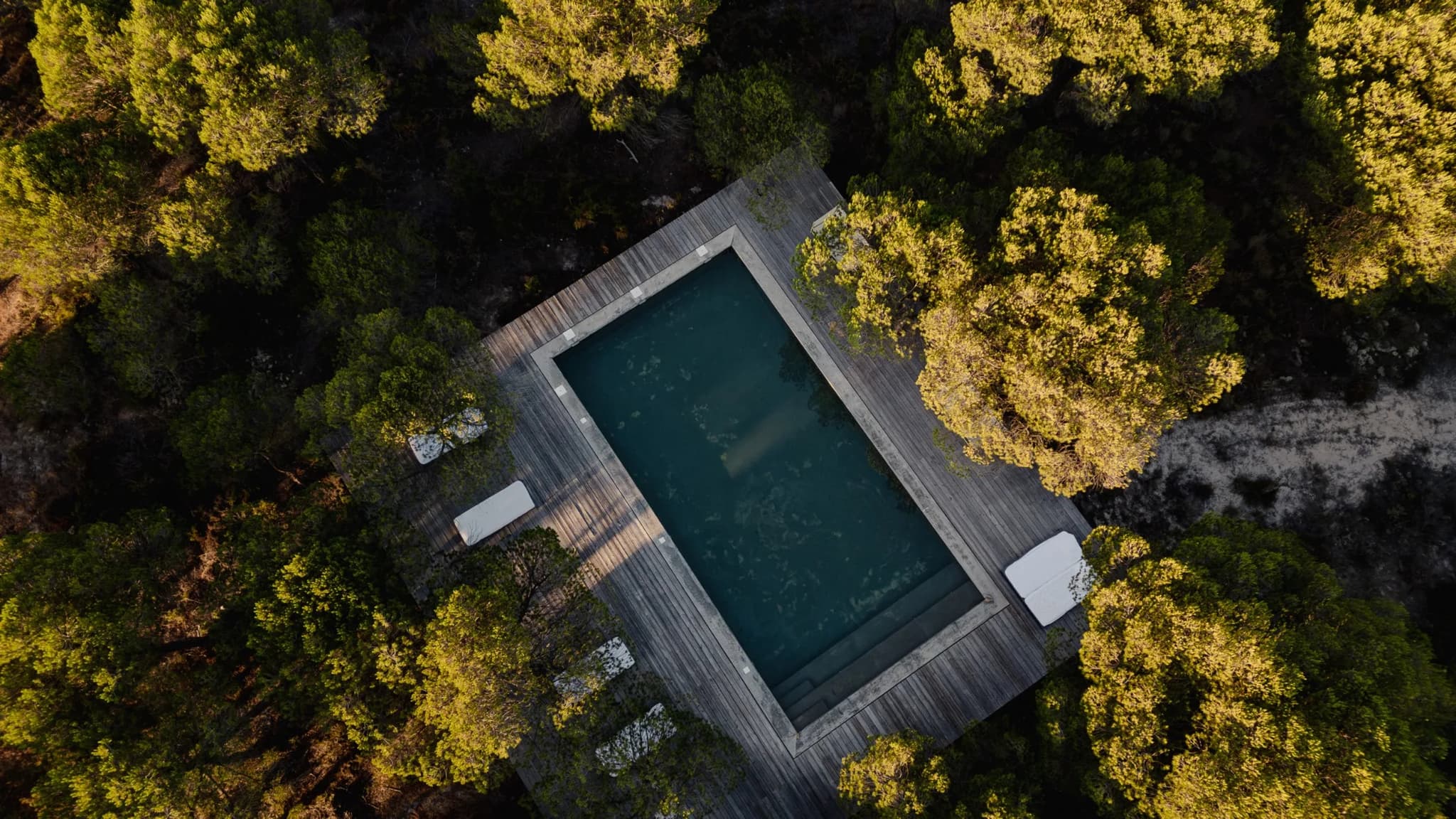 Aerial pool golden pine forest villa lapa comporta portugal padel