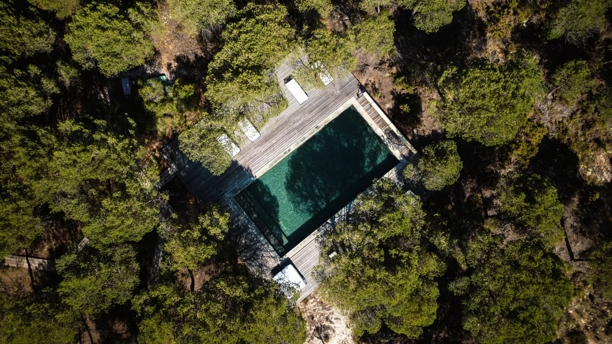 Aerial top down pool deck forest villa lapa comporta portugal padel