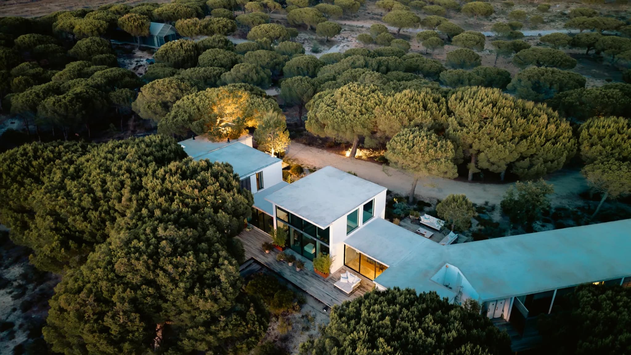 Aerial view pine forest rooftop villa lapa comporta portugal padel