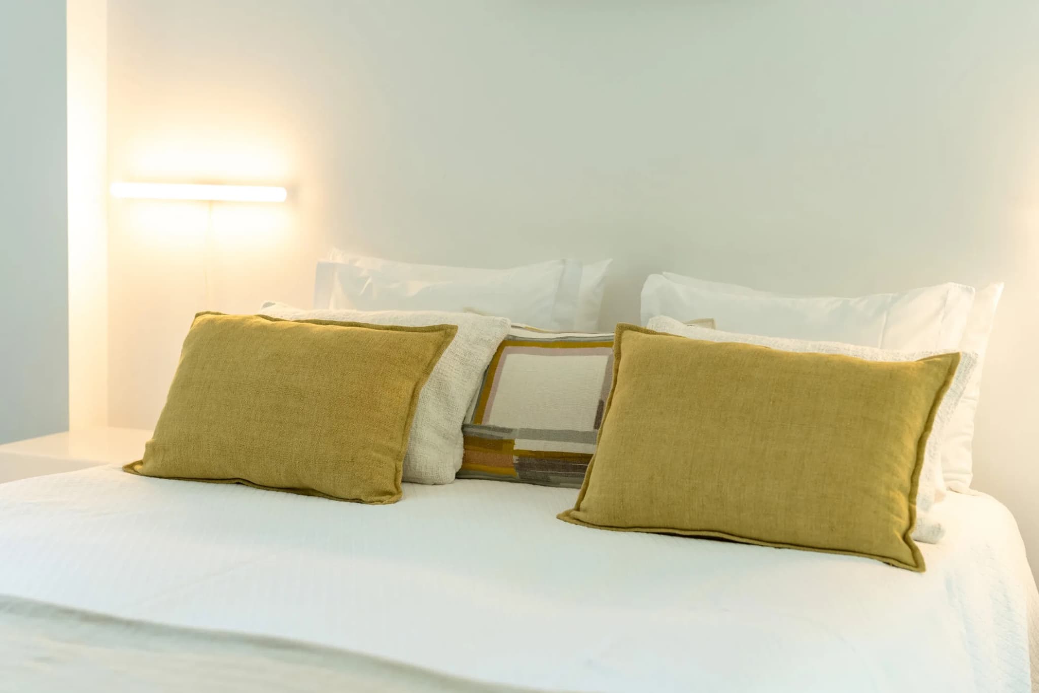 Bed detail mustard cushions villa lapa comporta portugal padel