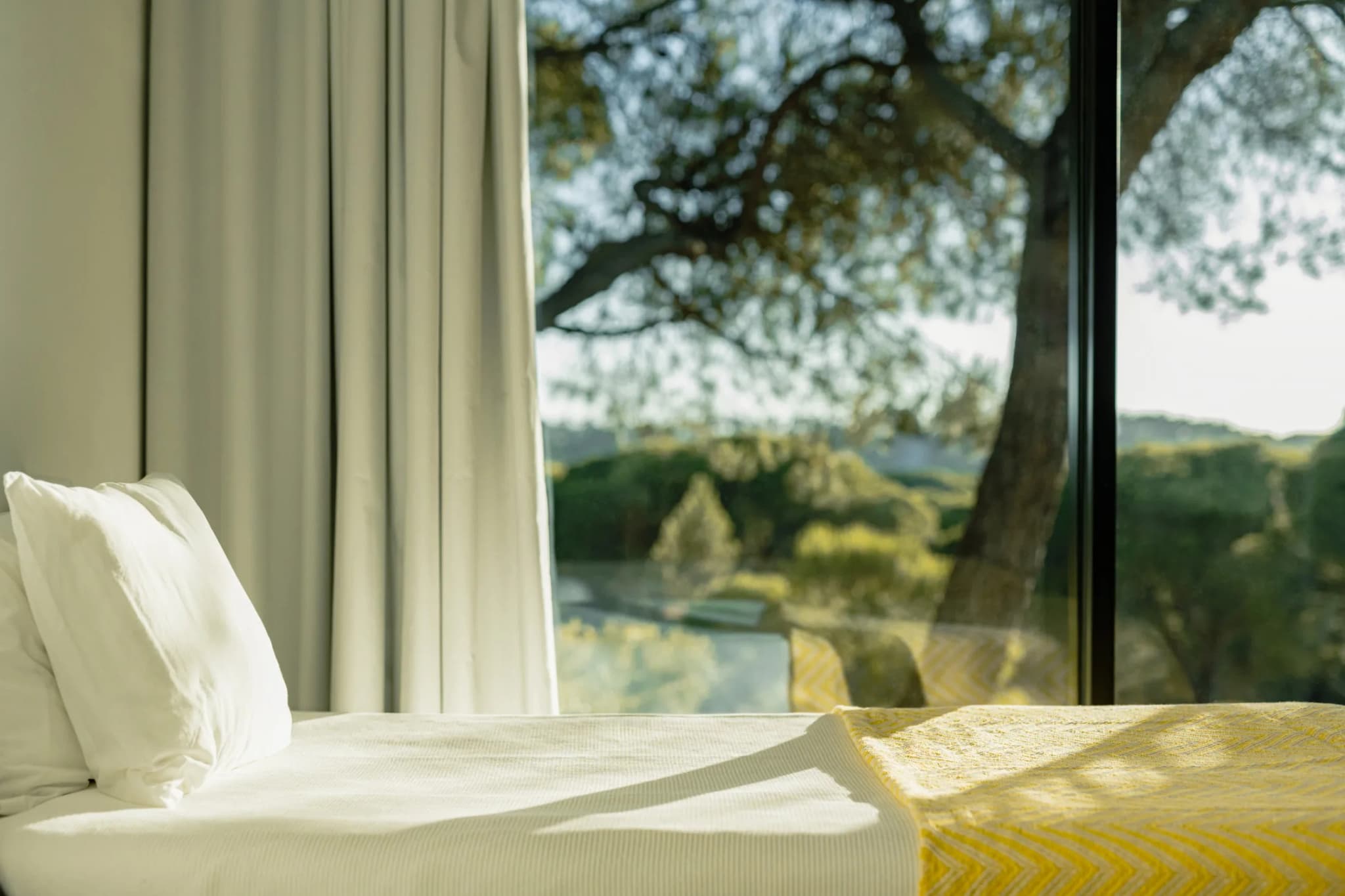 Bed pillow detail tree view villa lapa comporta portugal padel