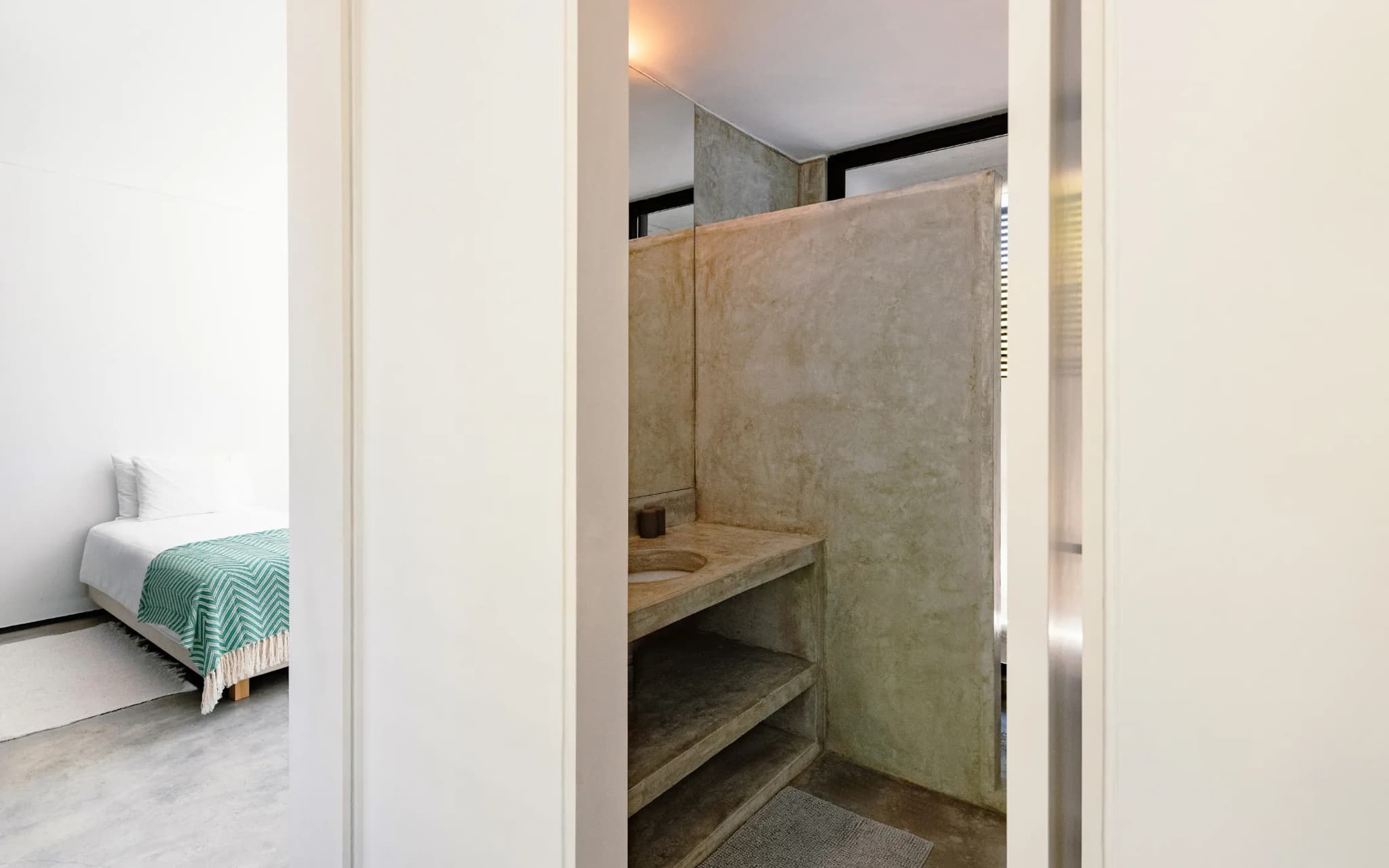 Bedroom doorway concrete bathroom villa lapa comporta portugal padel