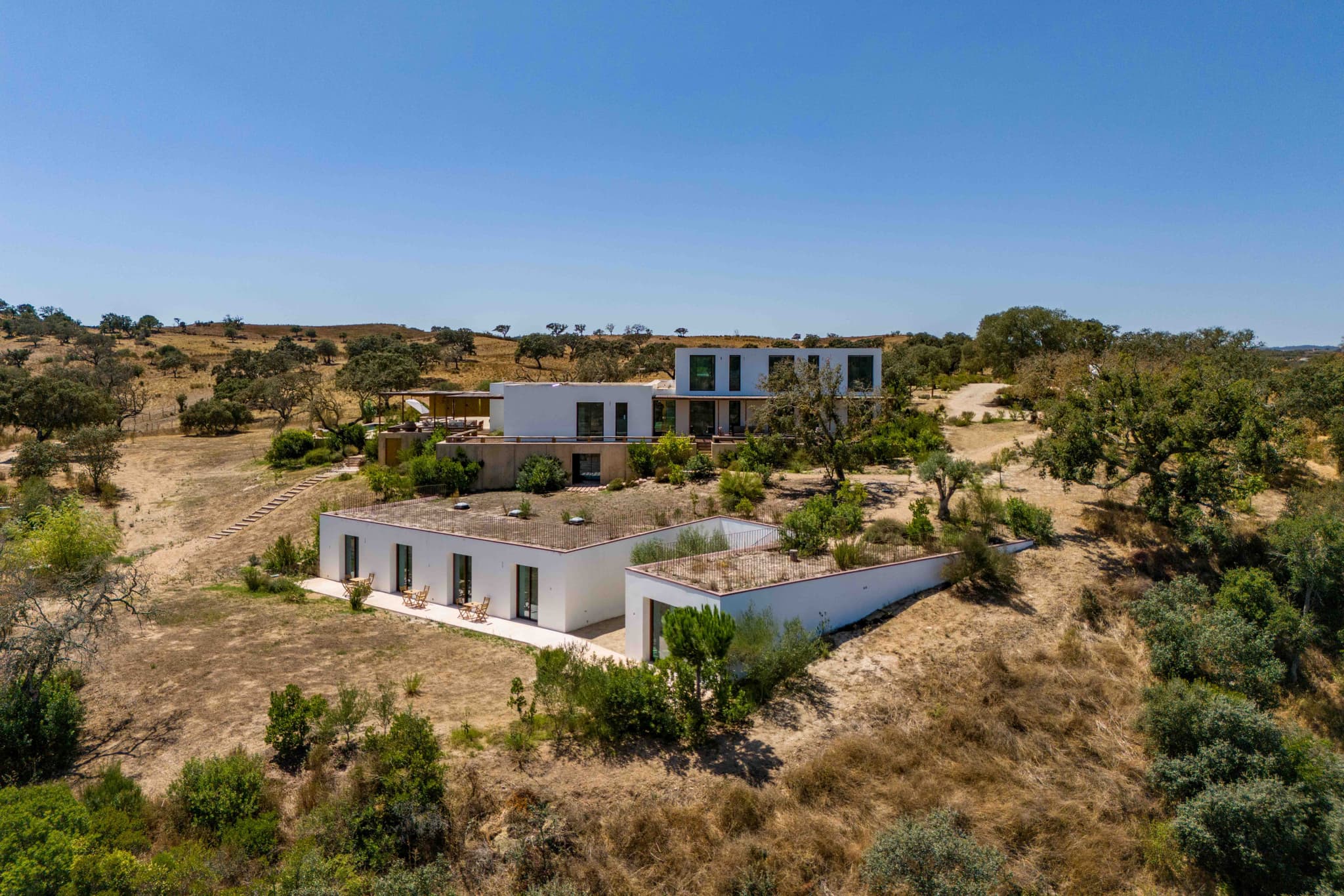 Aerial view modern house meadow villa quail comporta portugal padel 3