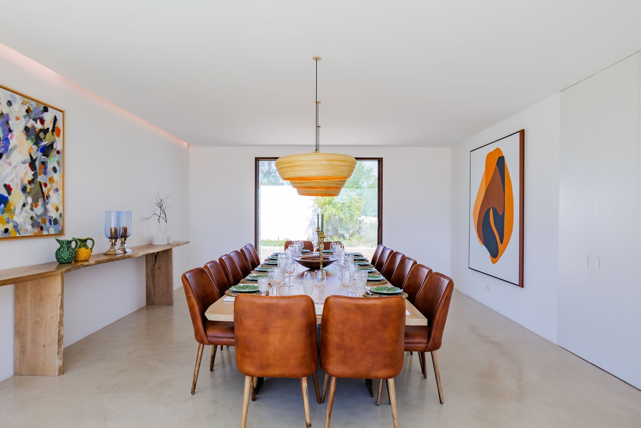Dining room long table leather chairs villa quail comporta portugal padel