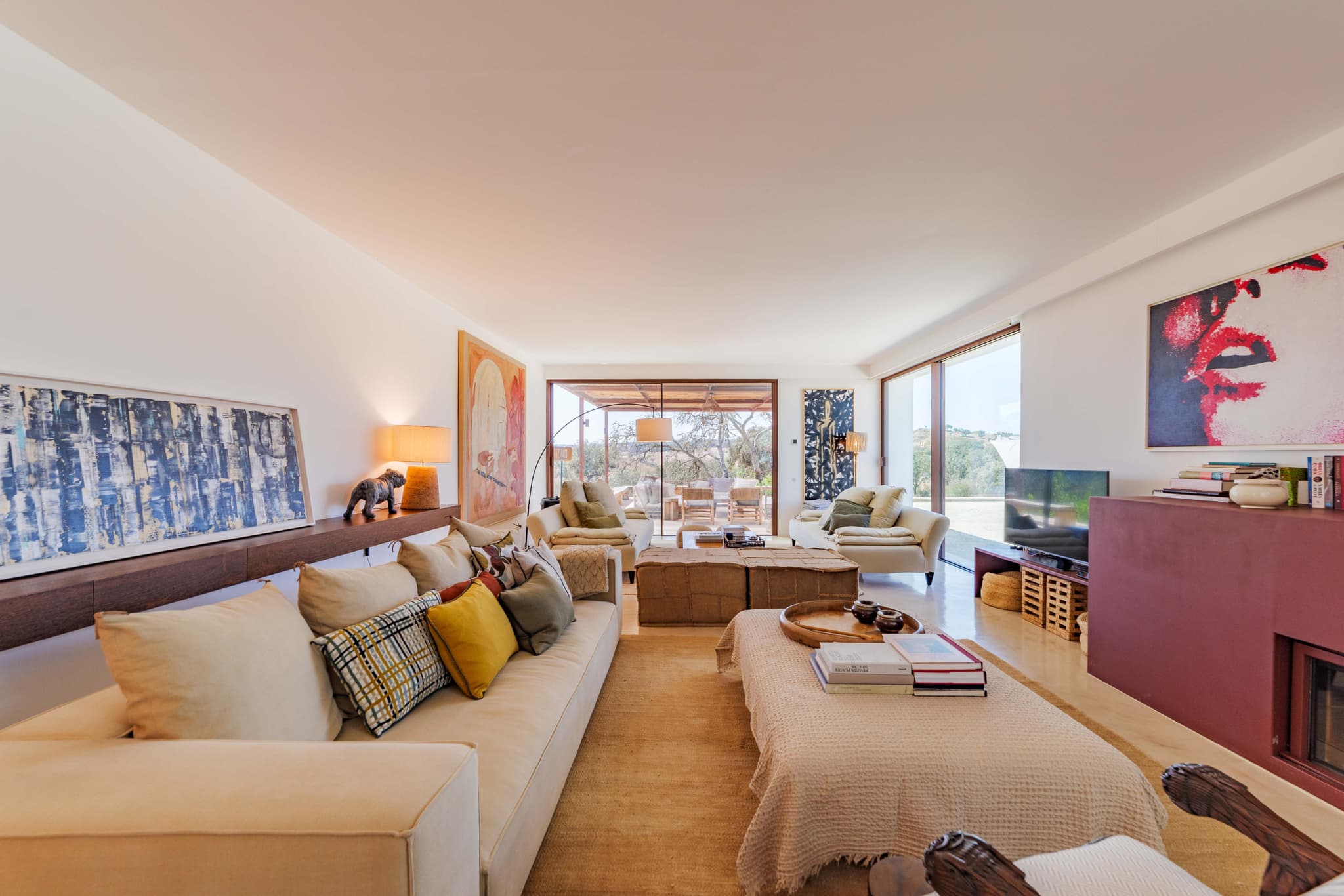 The living room, sofas around the fireplace